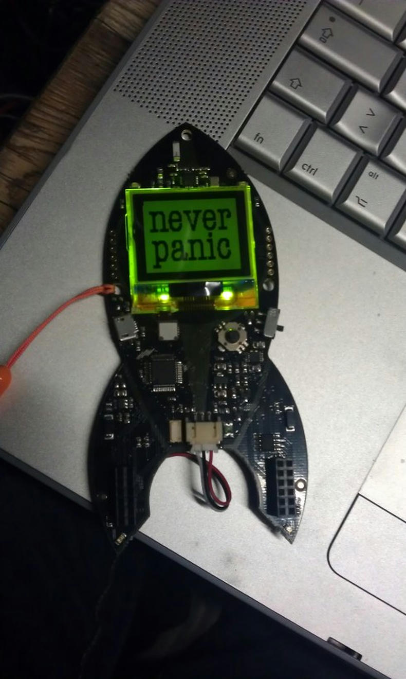 A rocket-shaped PCB with a display